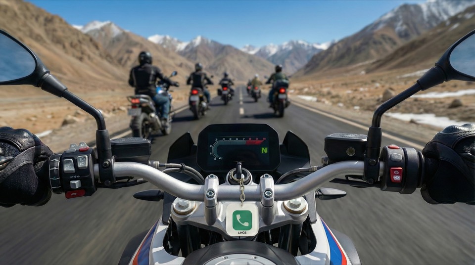 First-person view from a motorcycle on a mountain road with a lessworry tag on the handlebars