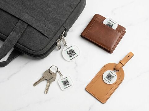 Flat lay of everyday items with lessworry tags attached